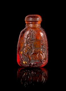 A Chinese Amber Snuff Bottle Height 2 3/8 inches.