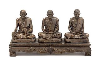 A Thai Bronze Figural Group Height 5 inches.