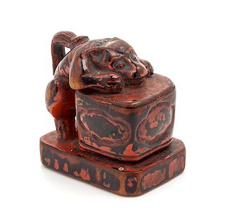 A Japanese Lacquered Wood Netsuke Height 1 1/4 inches.