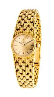 An 18 Karat Yellow Gold Wristwatch, Omega, 27.85 dwts.