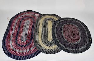 3 oval braided rugs