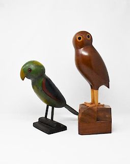 2 carved wooden birds