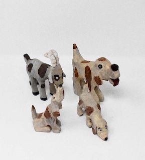 4 carved wooden animal figures