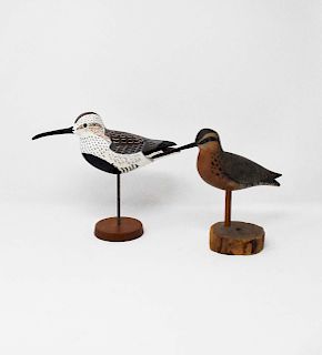 2 carved wooden shore birds
