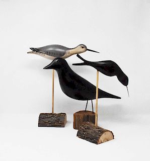 3 carved wooden birds