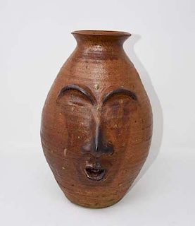 Grotesque pottery vase