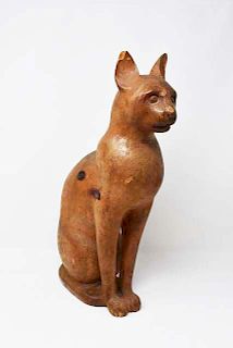 Wood carving of a cat