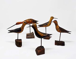 5 carved wooden shore birds