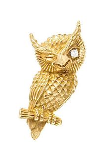 * A 14 Karat Yellow Gold and Diamond Owl Brooch, 12.20 dwts.