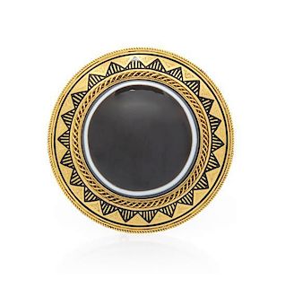 An Antique Yellow Gold, Banded Onyx and Enamel Mourning Brooch, 14.80 dwts.