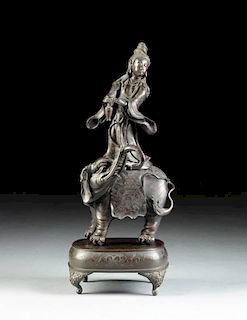 A CHINESE PATINATED BRONZE FIGURAL GROUP OF GUANYIN AND ELEPHANT, LATE 19TH/EARLY 20TH CENTURY,