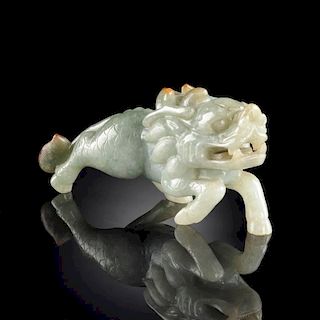 A CHINESE CARVED CELADON JADE FIGURE OF A MYTHICAL QILIN,