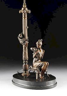 BRUNO ZACH (Austrian 1891-1945) A PATINATED BRONZE FIGURAL TABLE LAMP, "Lady with Barking Dog and Mischievous Monkey,"