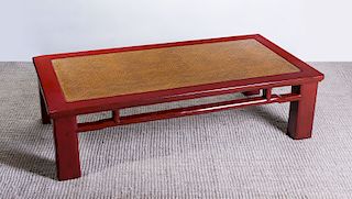 LARGE CHINESE RED LACQUER AND WICKER LOW TABLE