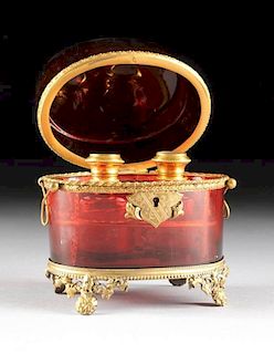 A BOHEMIAN RUBY GLASS FITTED PERFUME CASKET, CIRCA 1880,