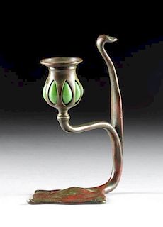 AN ART NOUVEAU PATINATED BRONZE AND GREEN GLASS COBRA CANDLE STICK, CIRCA 1900,