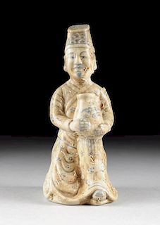 A VIETNAMESE/ANNAMESE BLUE AND WHITE PORCELAIN COURT OFFICIAL, POSSIBLY LATE 15TH/16TH CENTURY,