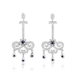 A Pair of 14K White Gold Sapphire and Diamond Earrings