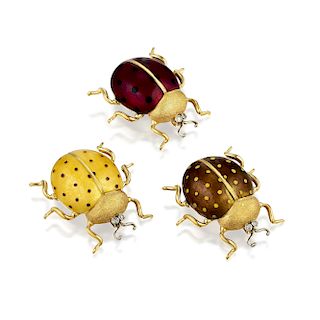 A Set of 18K Gold Enamel Ladybug Pins