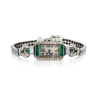 An Antique Platinum Emerald and Diamond Ladies Dress Watch