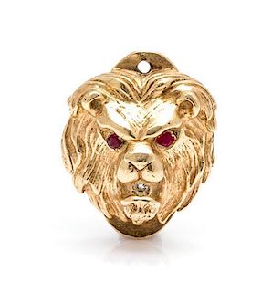 * A Yellow Gold, Ruby and Diamond Lion Motif Charm, 7.50 dwts.