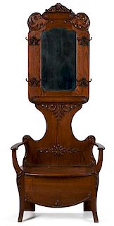 A CIRCA 1890 AMERICAN OAK HALL SEAT WITH MIRROR