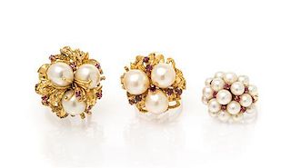 * A Collection of 14 Karat Yellow Gold, Cultured Pearl, Ruby and Simulated Ruby Rings, 25.90 dwts.
