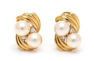 A Pair of 14 Karat Yellow Gold, Cultured Pearl and Diamond Earclips, 3.90 dwts.