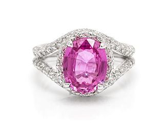 An 18 Karat White Gold, Pink Sapphire and Diamond Ring, 3.90 dwts.