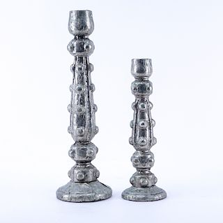 Two (2) Foil Clad Candlesticks. Unsigned.