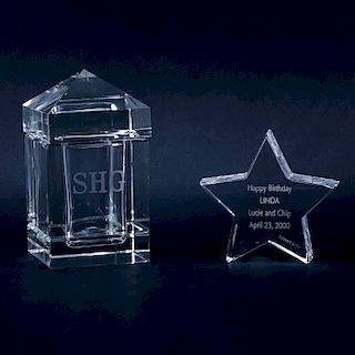 Two (2) Designer Crystal Keepsakes. Includes a Tiffany Star with etched inscription 4-1/4" H and a Cartier "Obelisk" Box Monogramed SHG 6-1/2" H.