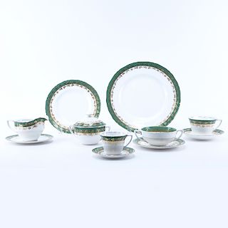 Sixty Nine (69) Piece Royal Worcester Arundel Green Partial Dinnerware Set. Includes: 11 dinner plates 10-3/4", 7 salad plates, 8 handled soup cups, 7