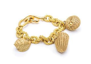 An 18 Karat Yellow Gold Nautical Motif Charm Bracelet with Three Attached Charms, 82.70 dwts.