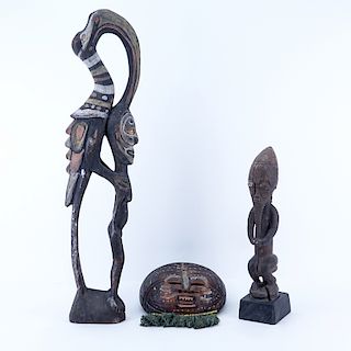 Antique Tribal Grouping of Three (3): African Polychrome Hornbill Bird with Figure, African Round Carved Wood Mask, and Possibly Dayak Carved Seated M