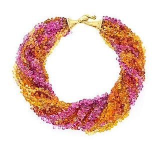 An 18 Karat Yellow Gold and Multi Color Sapphire Torsade Necklace, Andrew Clunn,