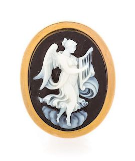 An Antique Yellow Gold and Onyx Cameo Pendant/Brooch, 7.30 dwts.
