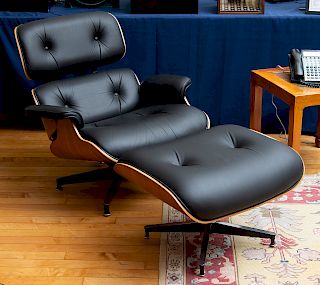 CHARLES AND RAY EAMES ROSEWOOD VENEER AND LEATHER LOUNGE CHAIR AND OTTOMAN FOR HERMAN MILLER, OF RECENT MANUFACTURE 