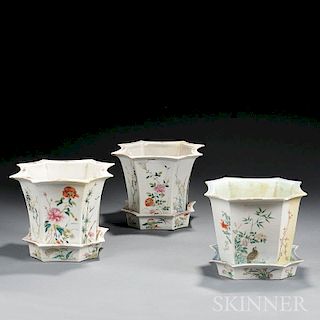 Three Enameled Eight-sided Porcelain Jardinieres with Trays