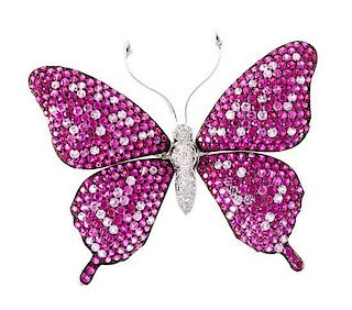 An 18 Karat Gold, Diamond and Pink Sapphire Butterfly Brooch, 14.50 dwts.