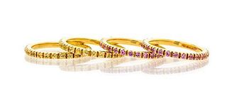 A Collection of 18 Karat Yellow Gold and Sapphire Eternity Bands, 7.00 dwts.