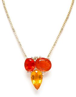 An 18 Karat Yellow Gold, Fire Opal and Diamond Pendant/Brooch with Removable Platinum and Diamond Chain, 28.00 dwts.