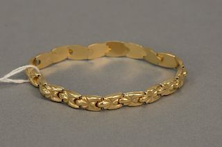14 karat gold bracelet with internal stretch bands.