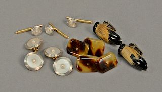 Three pairs of cufflinks to include one miniature deer hoof, one tortoise shell style, and one pair of mother of pearl along with th...