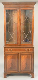 Mahogany two part cabinet. ht. 84in., wd. 35in., dp. 16 1/2in.