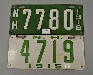 Two porcelain New Hampshire license plates, one dated 1916 (lg. 13 1/2in.) and other dated 1915 (lg. 13 1/4in.).