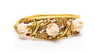 A Yellow Gold, Carved Coral and Diamond Flower Bangle Bracelet, 18.00 dwts.