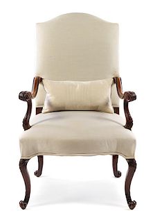 A Regence Walnut Armchair Height 44 1/2 inches.