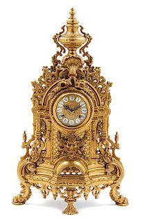 A French Gilt Metal Mantel Clock Height 24 inches.