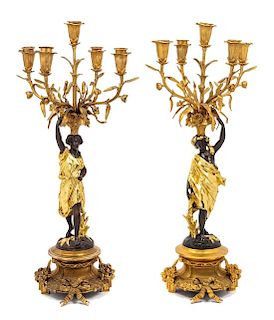 A Pair of Louis XV Style Gilt and Patinated Bronze Figural Five-Light Candelabra Height 22 3/4 inches.