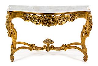 * A Louis XV Style Giltwood Console Table Height 36 1/4 x width 64 x depth 26 inches.
